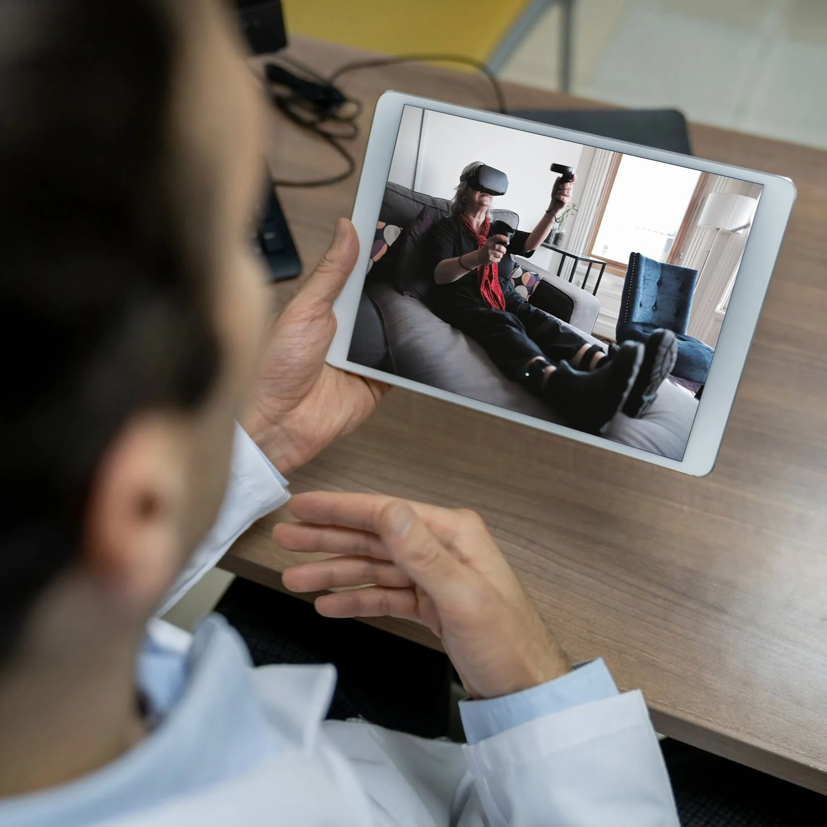 A Karuna pain coach working with a patient during a virtual session